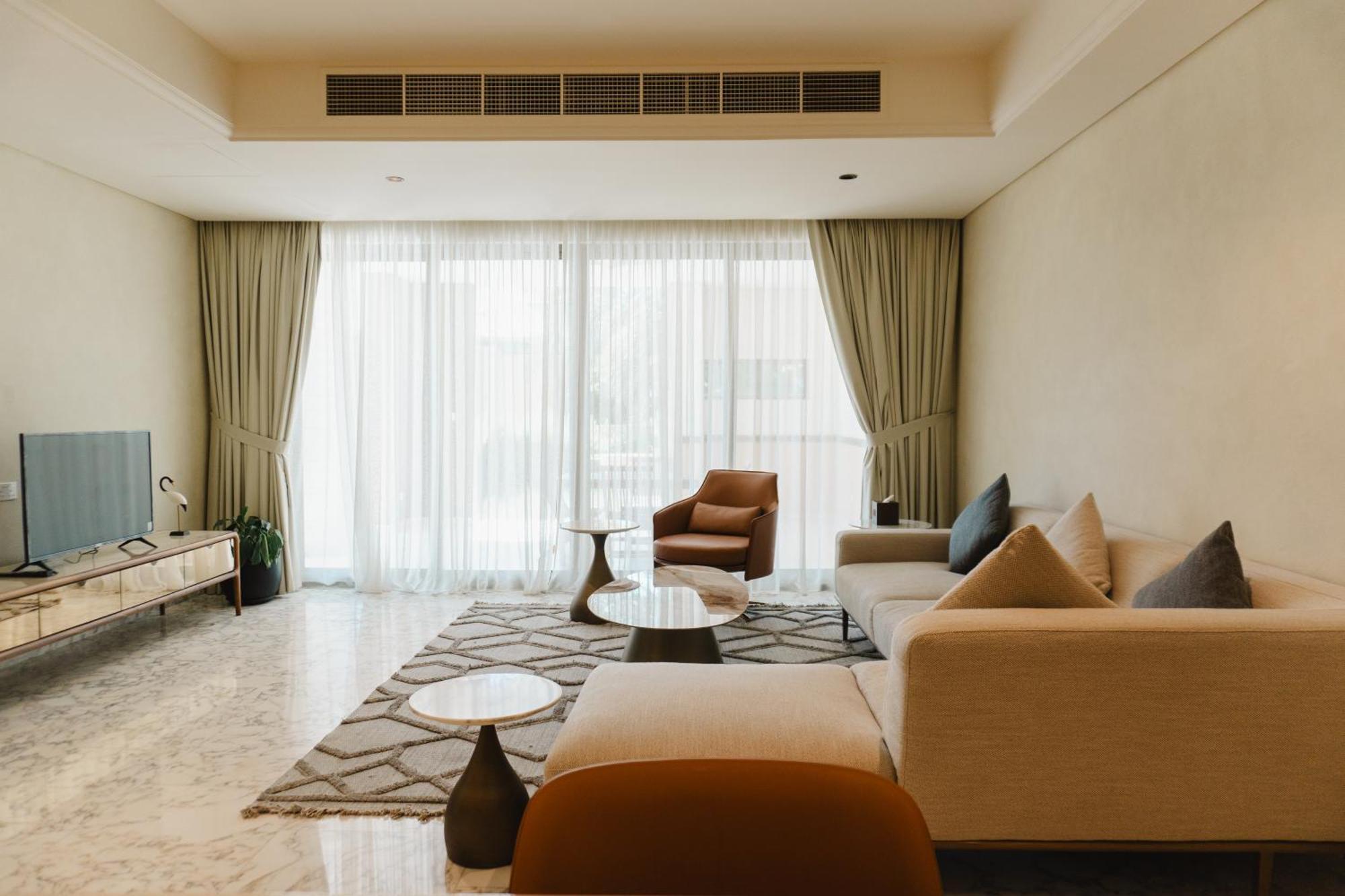 Palavra Resort Манама Екстериор снимка A living room in a condominium