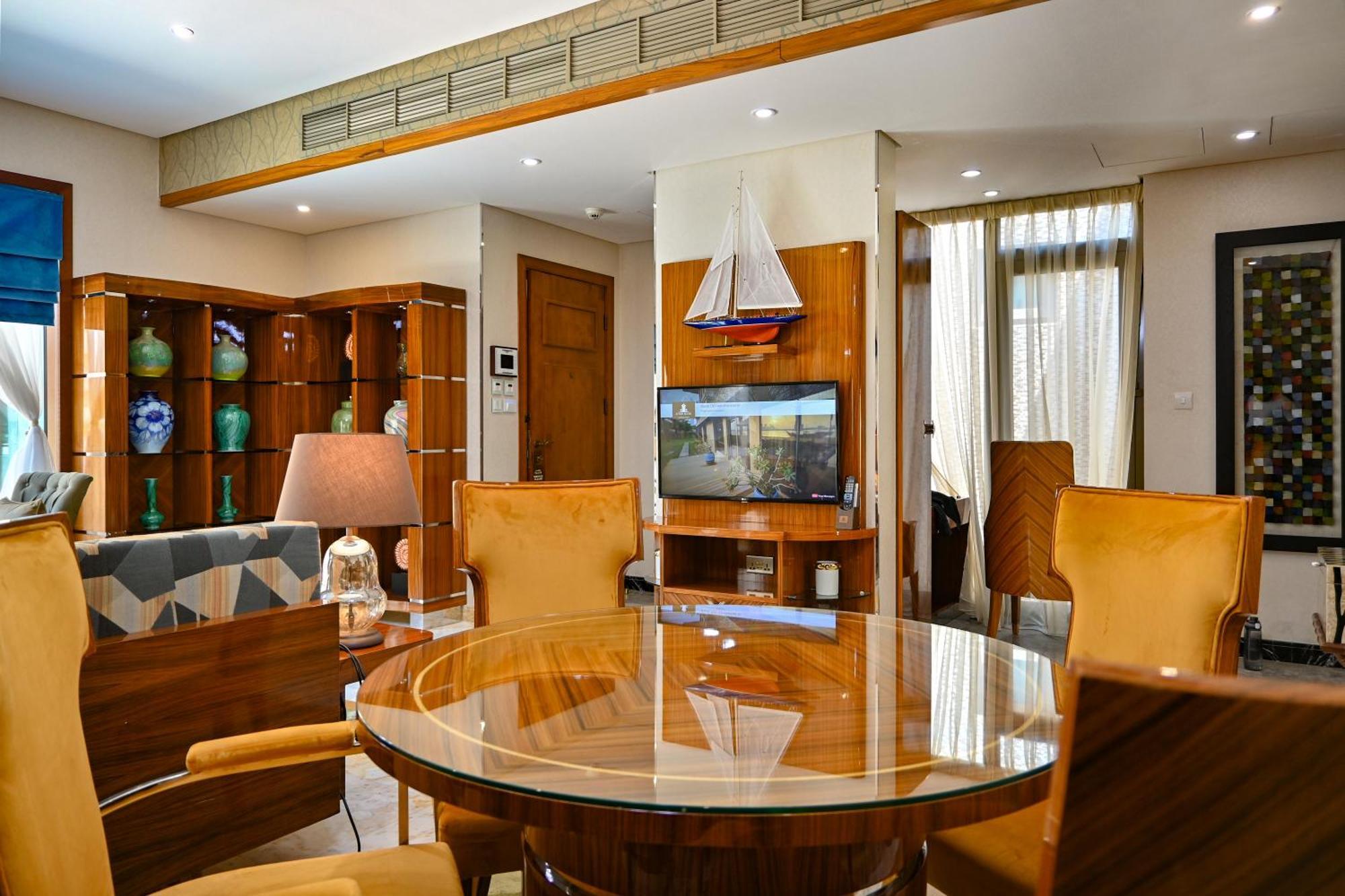 Palavra Resort Манама Екстериор снимка A dining room in a house in India